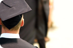 Image of student in graduate regalia.