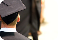 Image of a student in graduation regalia.
