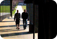 Image of two students walking.